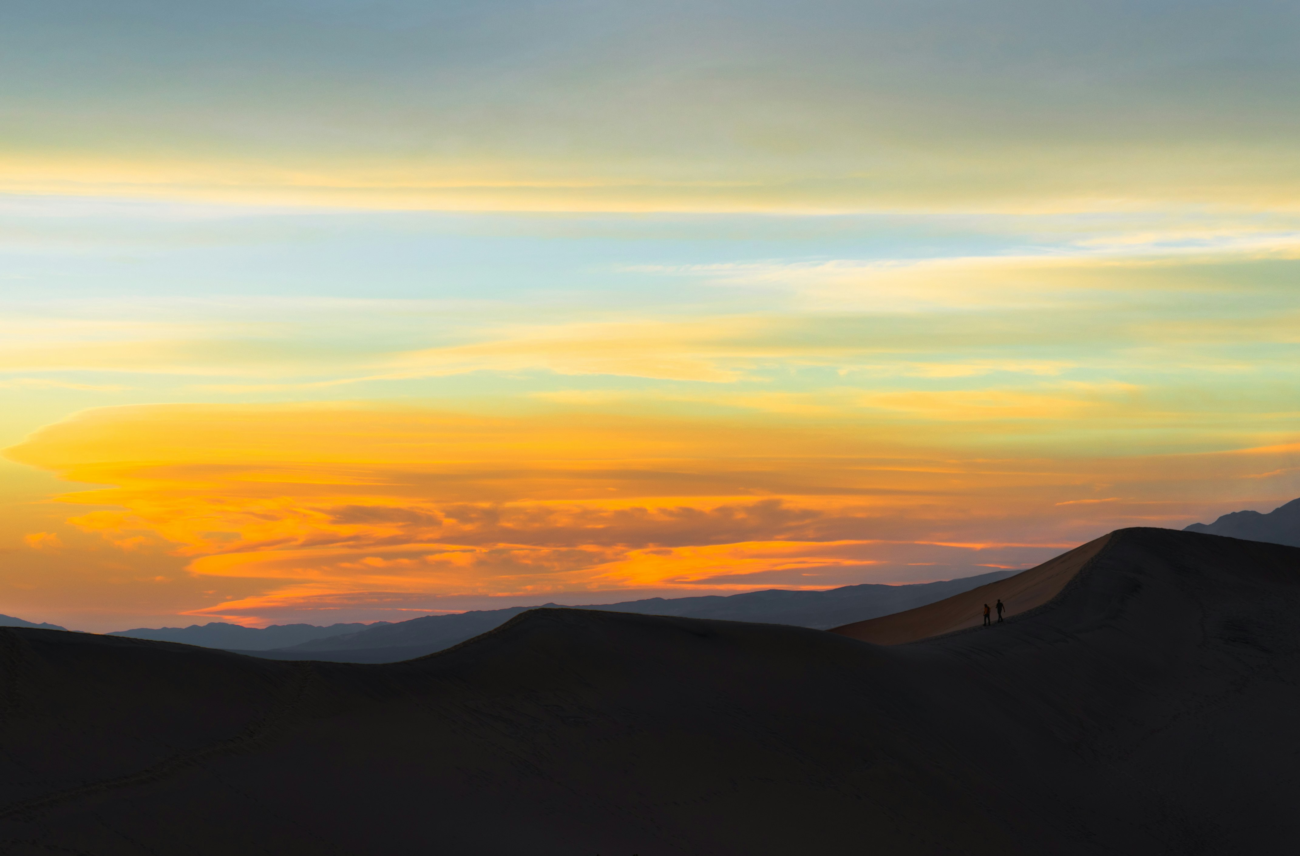 silhouette of mountain during sunset